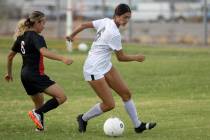 Valley High School's America Ortega Espinoza (6) and Spring Valley's Brylie Tavares-Bright (6) ...