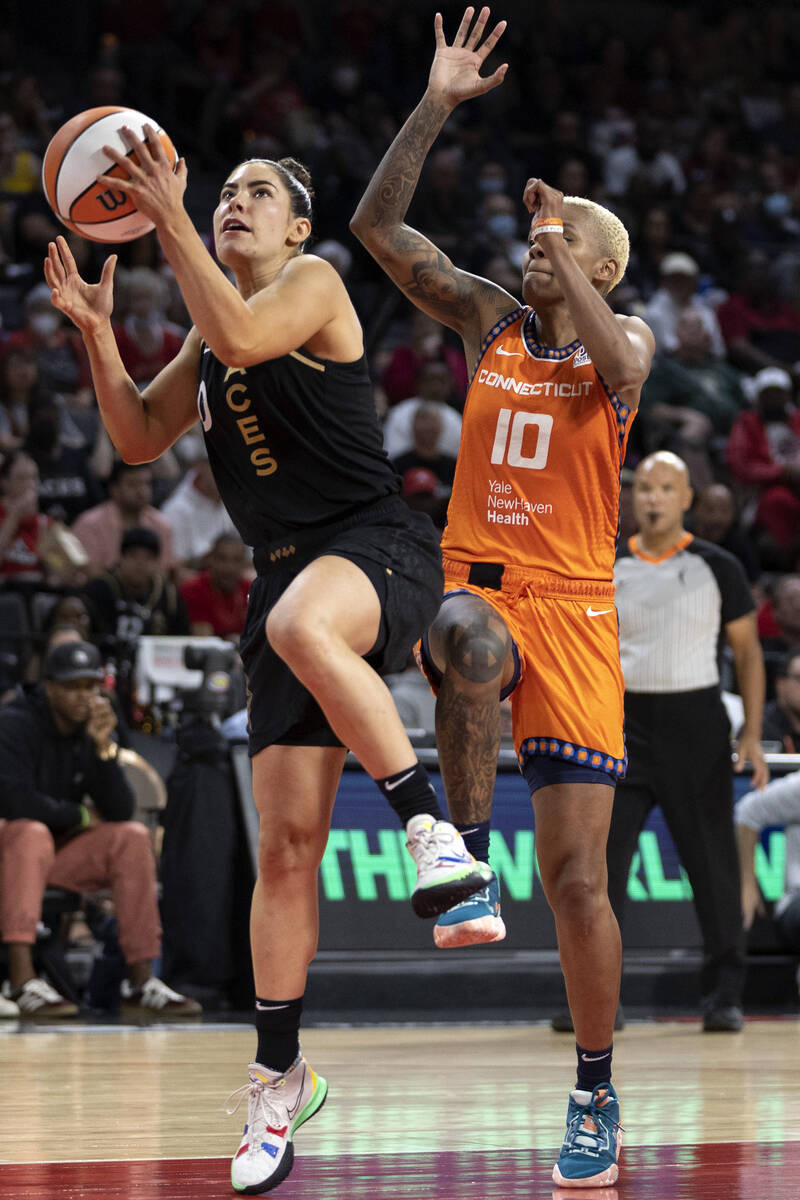 Las Vegas Aces guard Kelsey Plum (10) shoots against Connecticut Sun guard Courtney Williams (1 ...