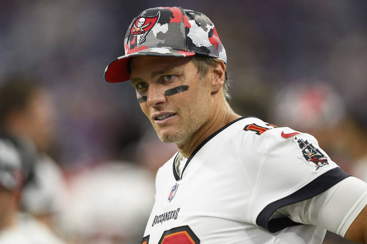 Tampa Bay Buccaneers quarterback Tom Brady (12) on the sidelines during an NFL football game ag ...
