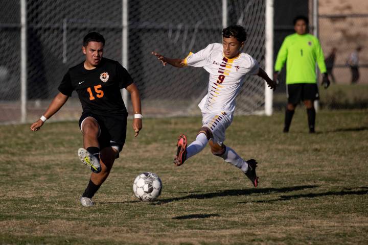 Chaparral's Angel Roldan (15) clears the ball past Eldorado's Esteven Palomares (9) during thei ...