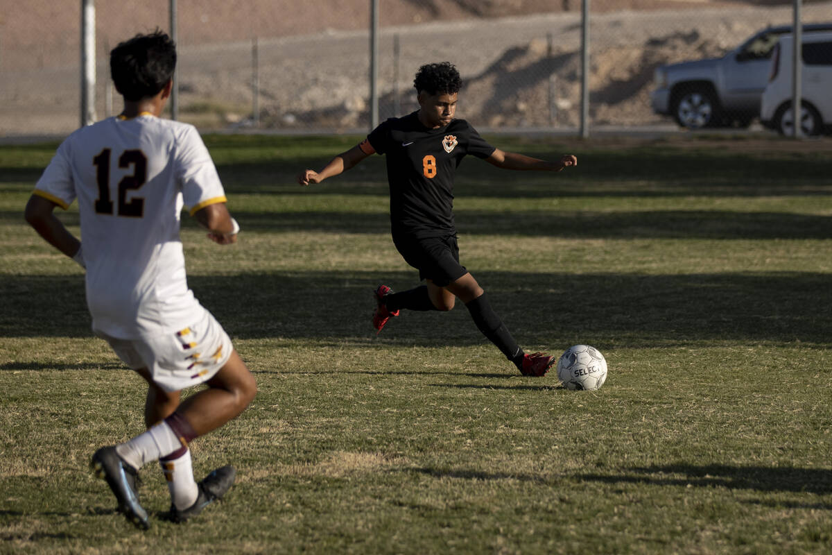 Chaparral's Kevin Mora (8) tries to clear the ball during their game against Eldorado at Chapar ...