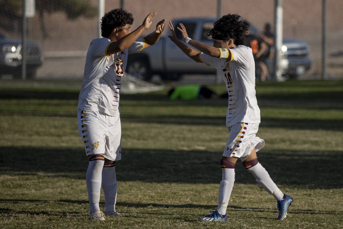 Eldorado's Pedro Barreras Avilez (21) and Rafael Lucio Vargas (10) celebrate an Eldorado goal a ...
