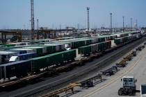 FILE - Freight train cars sit in a Union Pacific rail yard on Wednesday, Sept. 14, 2022, in Com ...