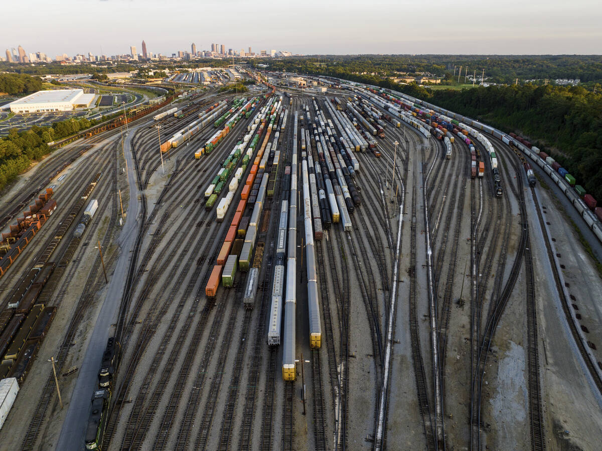 Freight train cars sit in a Norfolk Southern rail yard on Wednesday, Sept. 14, 2022, in Atlanta ...