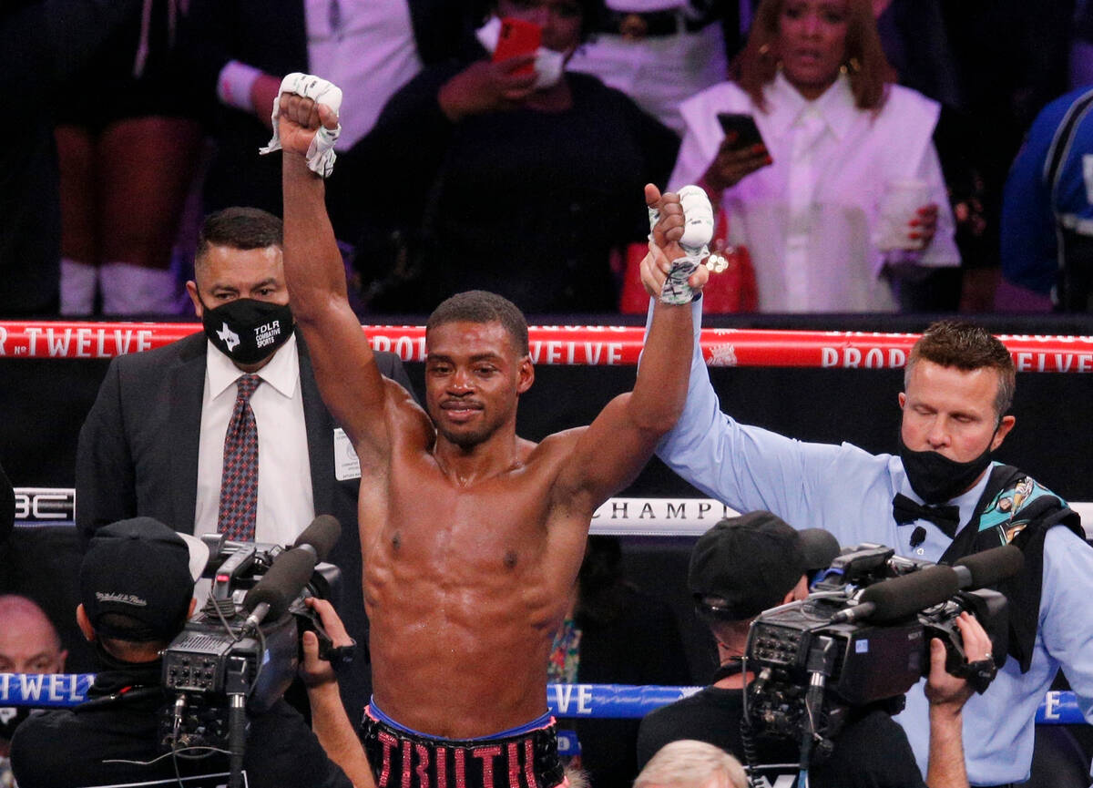 Errol Spence Jr. celebrates after defeating Danny Garcia by unanimous decision in a welterweigh ...