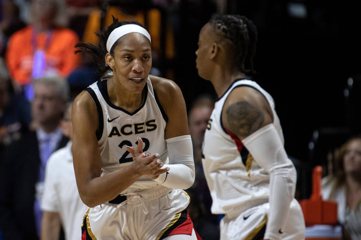 Las Vegas Aces forward A'ja Wilson (22) celebrates after scoring during the first half in Game ...