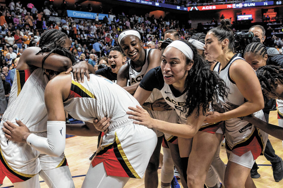 The Las Vegas Aces celebrate after winning the 2022 WNBA Championship against the Connecticut S ...