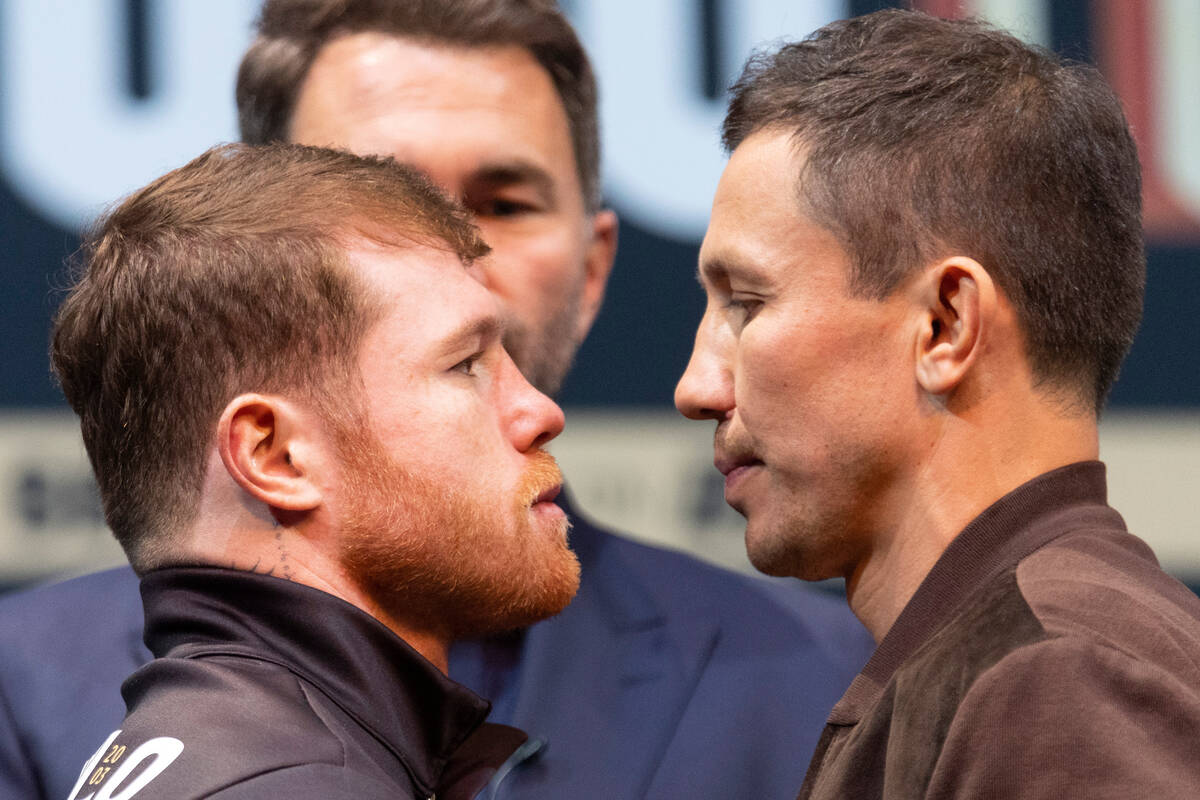 Saul "Canelo" Alvarez, left, and Gennadiy Golovkin, right face off during a press con ...