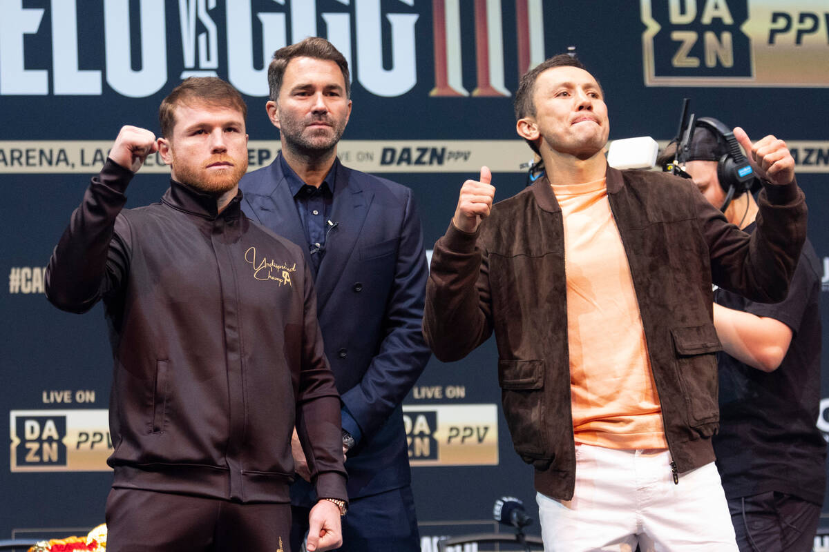 Saul "Canelo" Alvarez, left, and Gennadiy Golovkin, right pose during a press confere ...