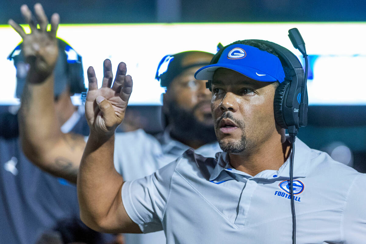 Bishop Gorman head coach Brent Browner signals the 4th quarter versus Hamilton during the secon ...