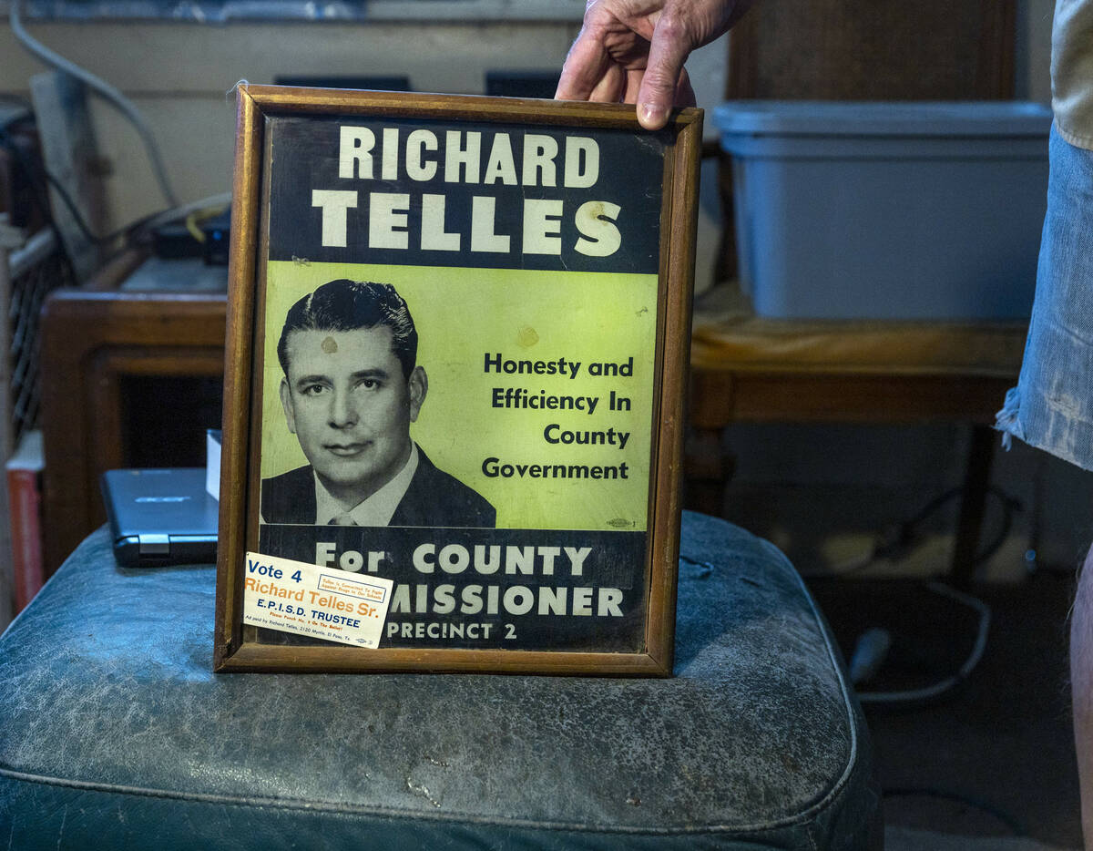 Telles family friend George Thomas, at home with an old advertisement announcing Richard Telles ...