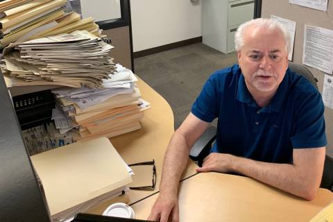 Jeff German working in the Las Vegas Review-Journal offices in 2018. (Photo by Harrison Keely/L ...