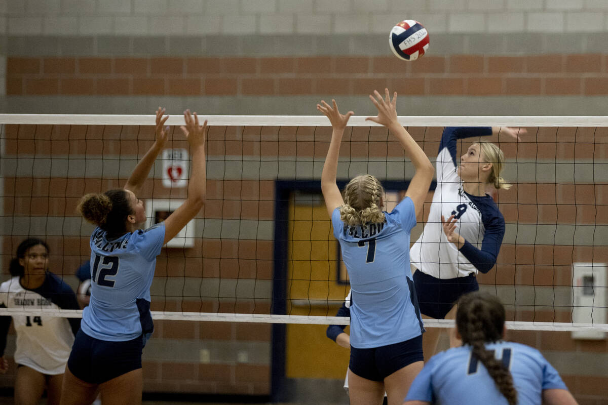 Shadow Ridge's Lexi Luszeck (9) makes a hit during their match against Foothill High School on ...