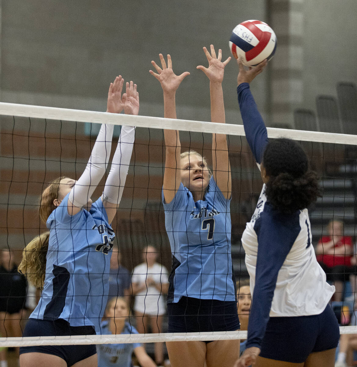 Shadow Ridge's Jyniah Sanders (14) goes up for a hit against Foothill High School on Thursday, ...