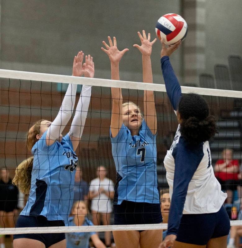 Shadow Ridge's Jyniah Sanders (14) goes up for a hit against Foothill High School on Thursday, ...