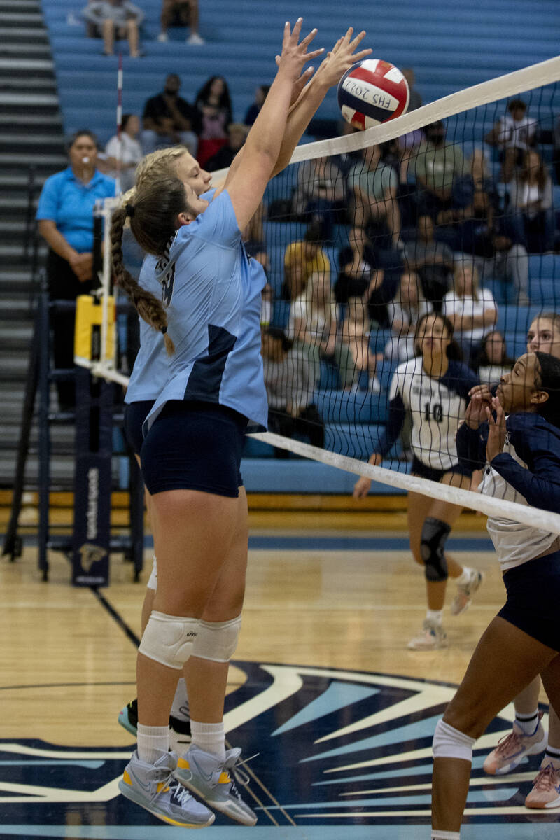 Foothill's Madelyn Neibaur (7) and Siena Novak (14) make a block against Shadow Ridge at Foothi ...