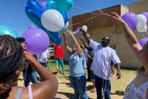 Makayla Adams' parents Monica and Donald Miner release balloons into the sky outside the Marble ...