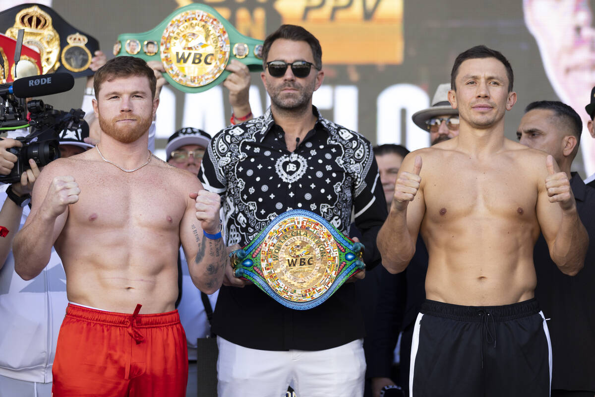 Saul "Canelo" Alvarez, left, and Gennadiy Golovkin, right, pose during a ceremonial w ...