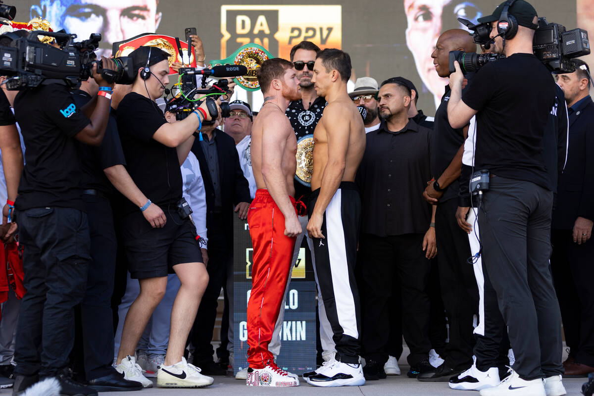 Saul "Canelo" Alvarez, left, and Gennadiy Golovkin, face off during a ceremonial weig ...