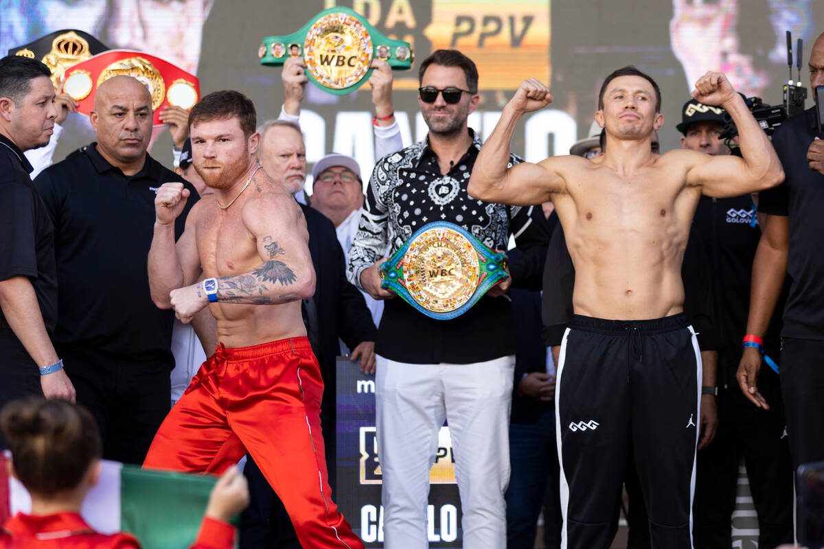 Saul "Canelo" Alvarez, left, and Gennadiy Golovkin, right, pose during a ceremonial w ...