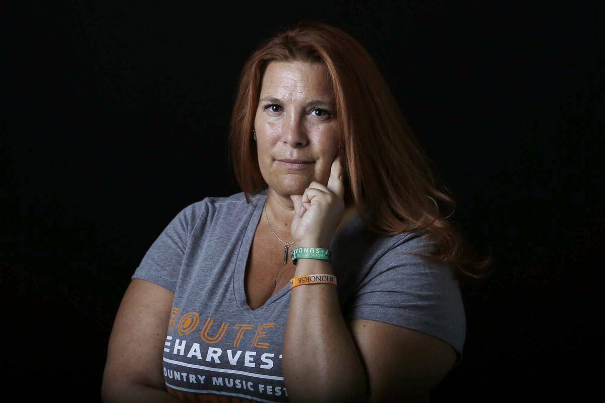 Heather Gooze, a Route 91 Harvest festival shooting survivor, poses for a photo at the Las Vega ...