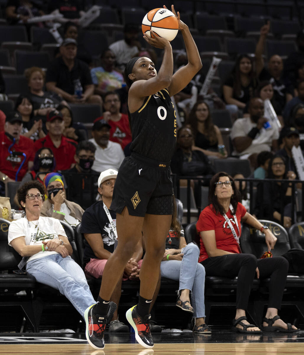 Las Vegas Aces guard Jackie Young (0) shoots against the Atlanta Dream during the first half of ...