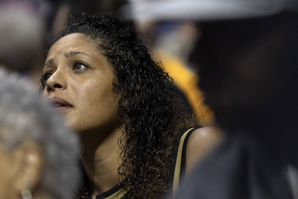 A Las Vegas Aces fan looks toward the scoreboard during the second half in Game 3 of a WNBA bas ...