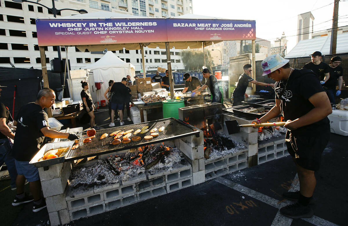 Food from Chef Justin Kingsley Hall and Bazaar Meat by Jose Andres is prepared as part of The C ...