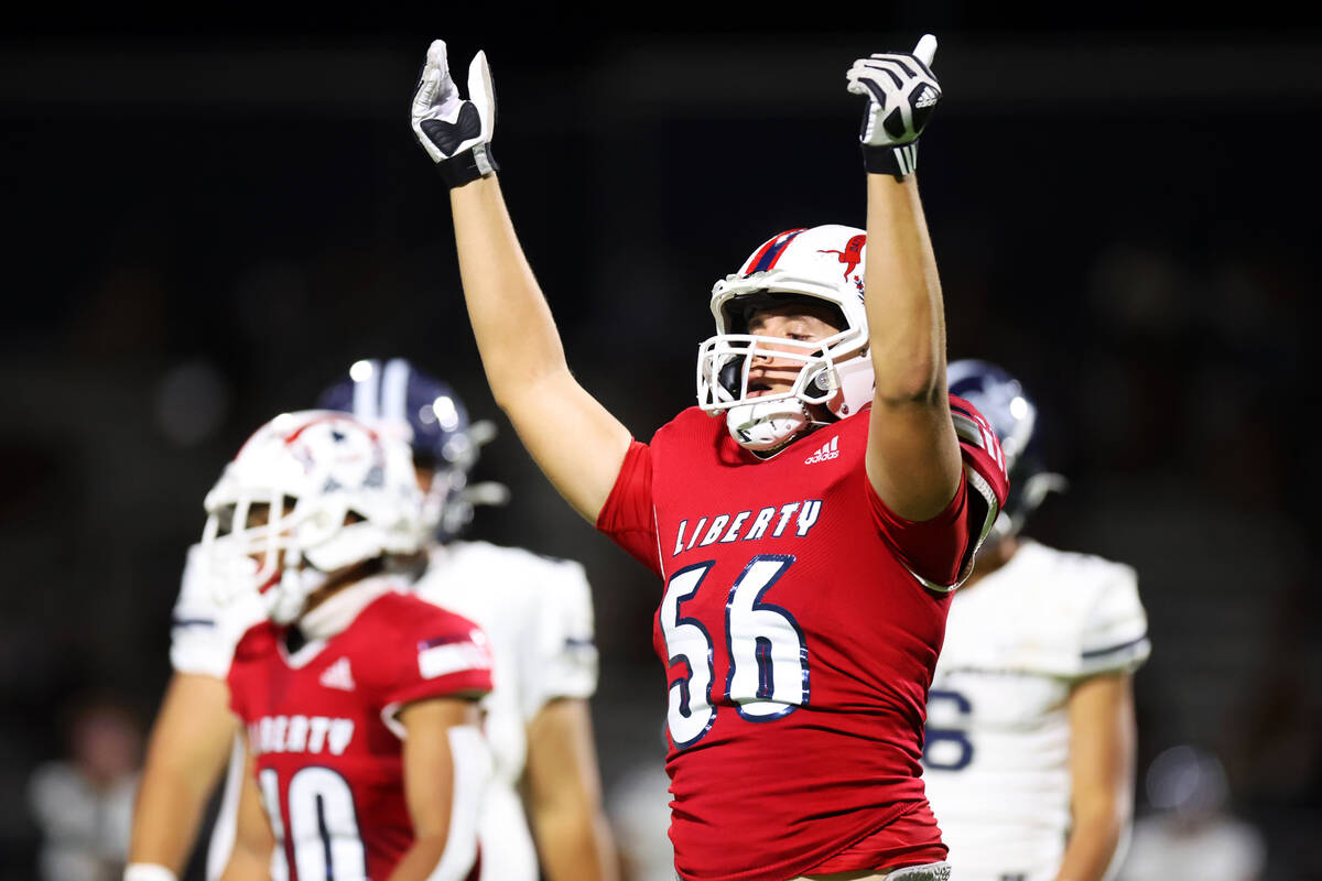 Liberty's Derek Jones (56) reacts after getting a tackle in the first half of a football game a ...