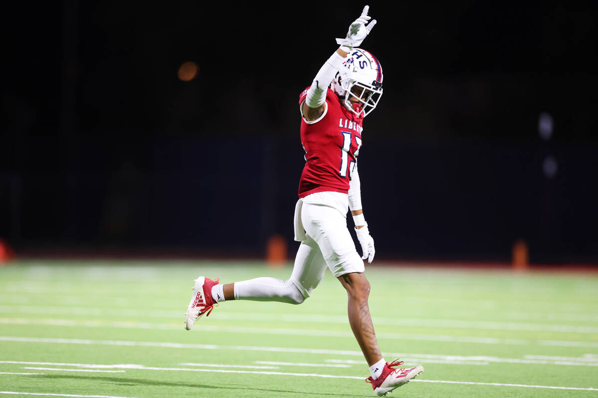 Liberty's Rayshaun Manker (13) reacts after blocking an extra point attempt by Kamehameha Kapal ...