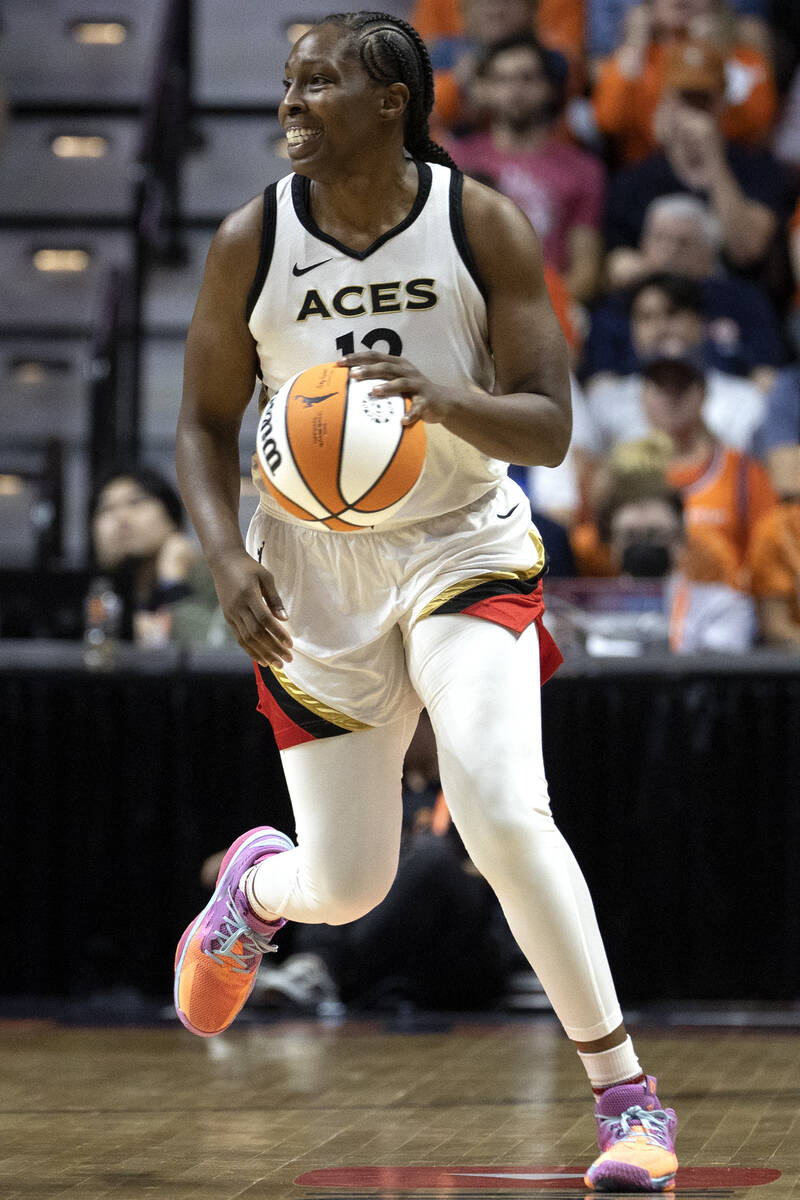 Las Vegas Aces guard Chelsea Gray (12) dribbles up the court during the second half in Game 3 o ...