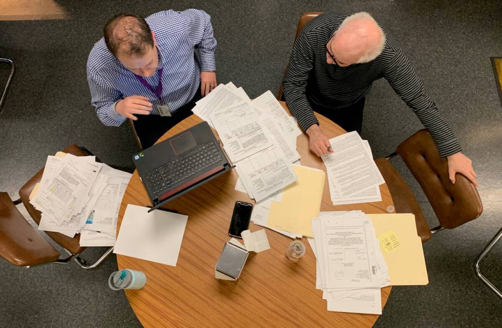 Investigative reporters Arthur Kane, left, and Jeff German work on a story at the Review-Journa ...