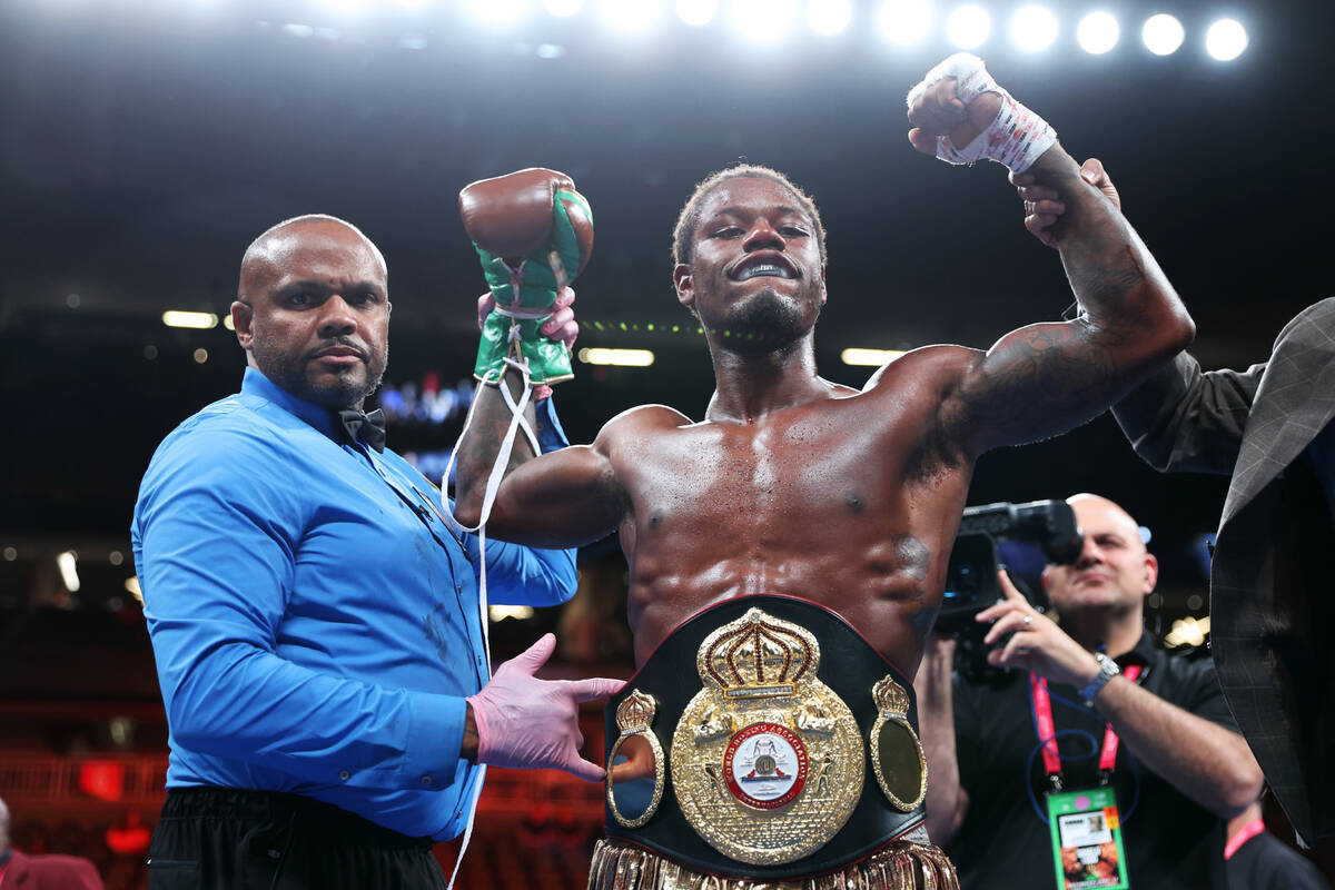 Austin Williams raises his hands in victory after an unanimous decision win against Kieron Conw ...