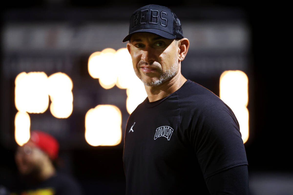 UNLV football head coach Marcus Arroyo attends a football game between Kamehameha Kapalama and ...