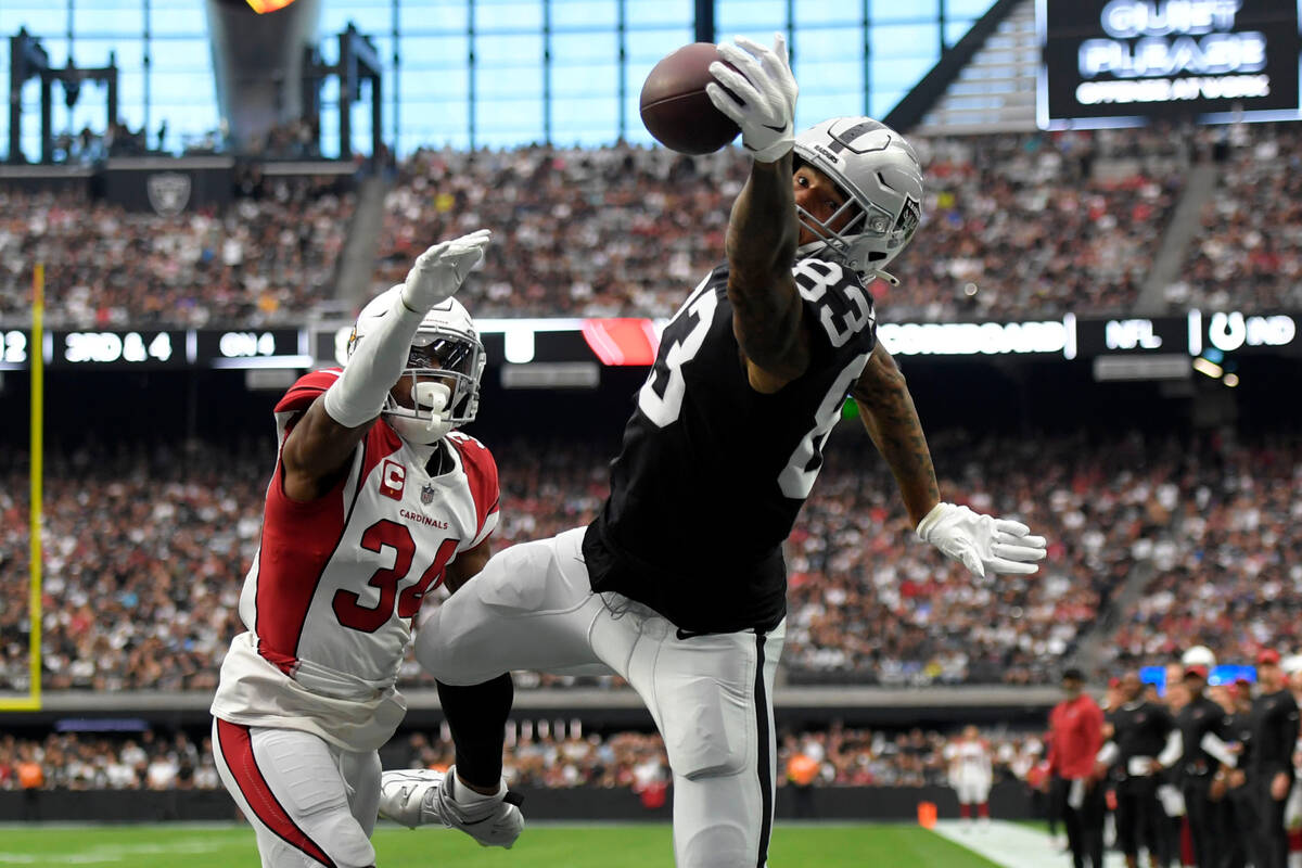 Las Vegas Raiders tight end Darren Waller (83) reaches for a ball in the end zone but cannot ma ...