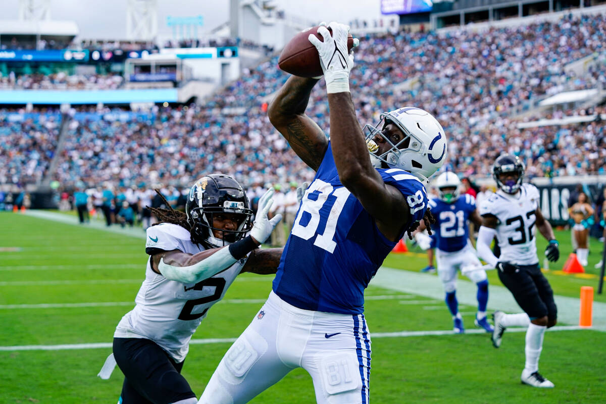 Indianapolis Colts tight end Mo Alie-Cox (81) attempts to make a catch over Jacksonville Jaguar ...