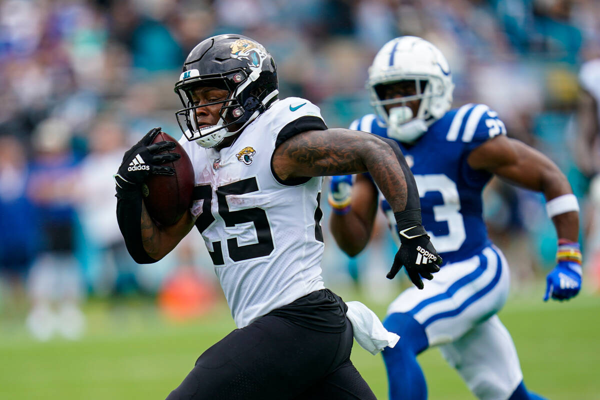 Jacksonville Jaguars running back James Robinson (25) runs in for a touchdown against the India ...