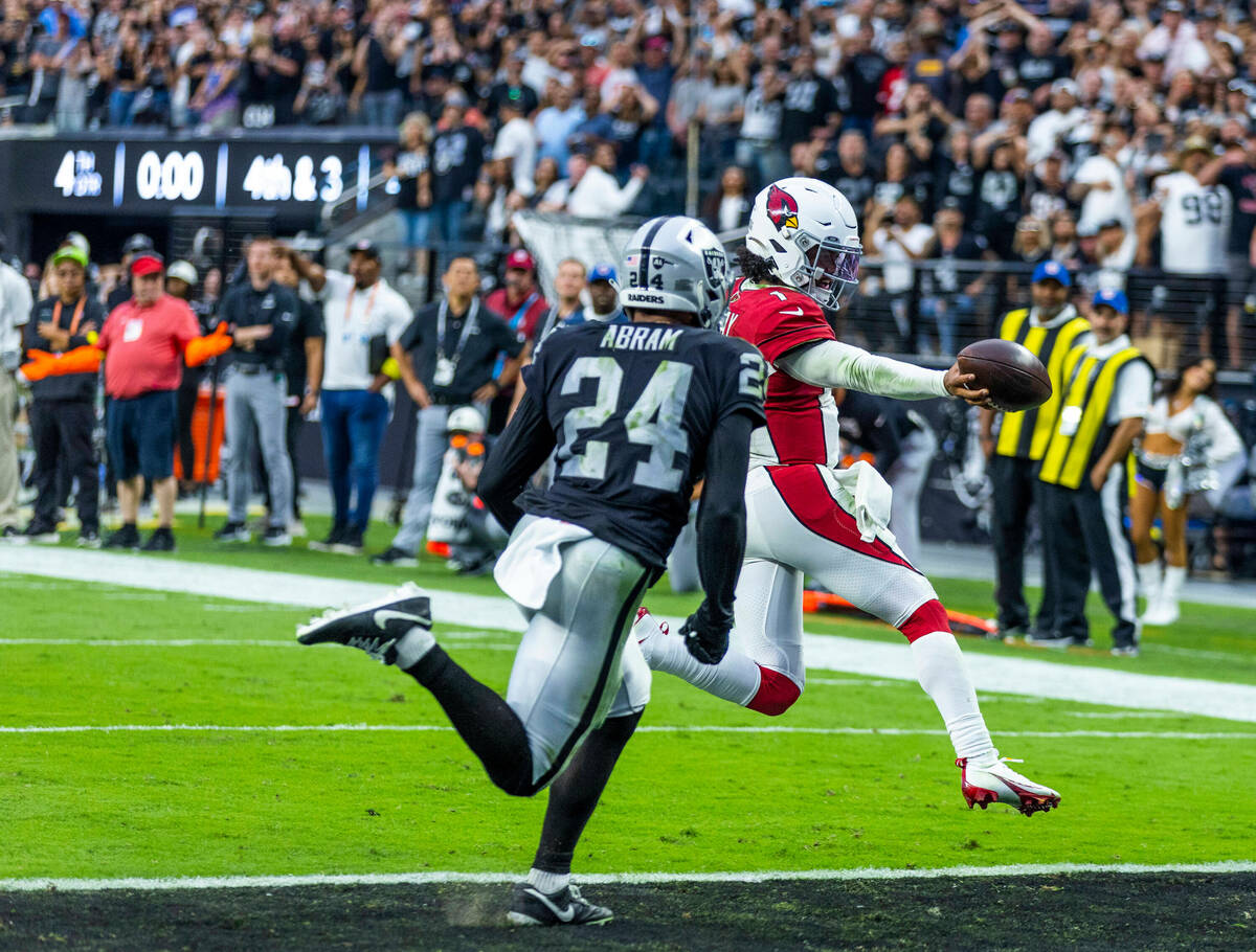 Arizona Cardinals quarterback Kyler Murray (1) scampers into the end zone past Raiders safety J ...