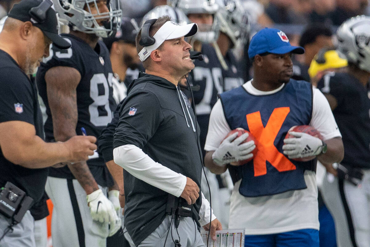 Raiders head coach Josh McDaniels reacts to a penalty during the second half of an NFL game aga ...