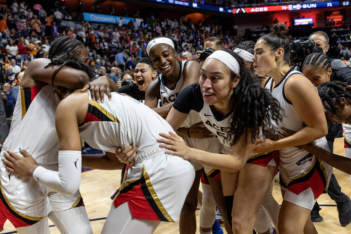 The Las Vegas Aces celebrate after winning the 2022 WNBA Championship against the Connecticut S ...