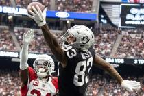 Raiders tight end Darren Waller (83) stretches but unable to catch the ball as Arizona Cardinal ...