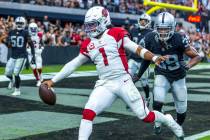 Arizona Cardinals quarterback Kyler Murray (1) scampers into the end zone past Raiders cornerba ...