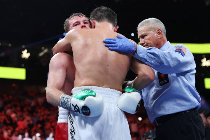 Saul "Canelo" Alvarez, left, and Gennadiy "GGG" Golovkin, embrace following ...