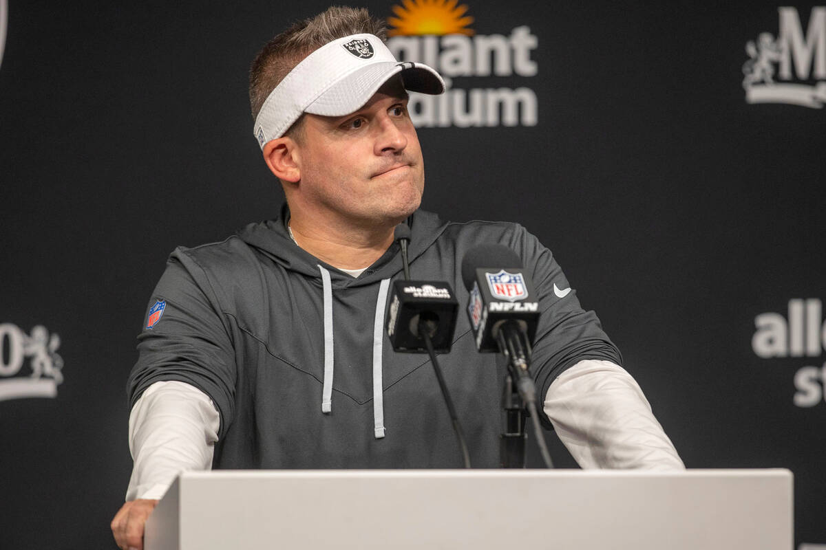 Raiders head coach Josh McDaniels takes questions from the media during a news conference after ...