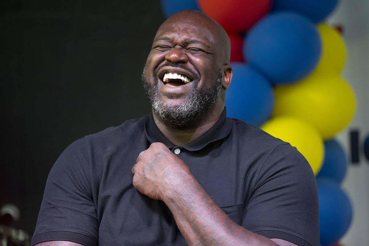 Shaquille O’Neal laughs during a speech by Mayor Carolyn Goodman during an event at Dool ...