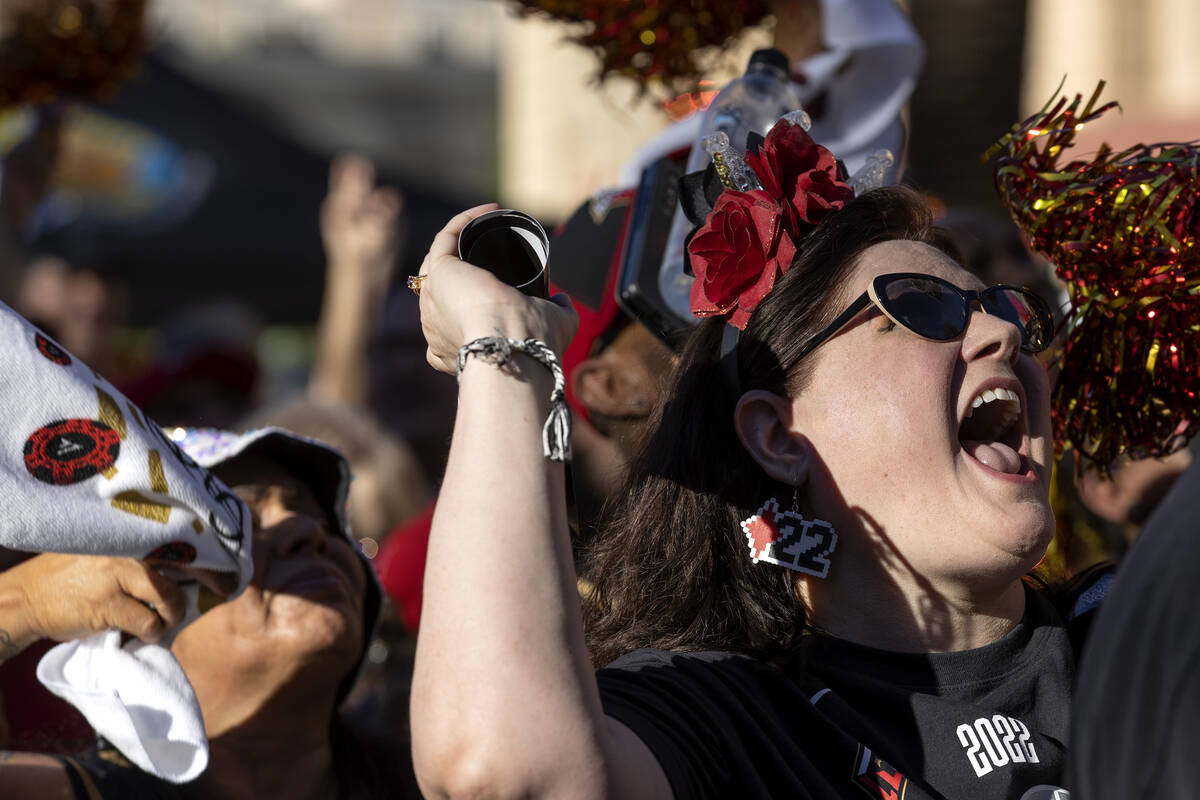 Stacy Mabini, of Las Vegas, cheers for the Las Vegas Aces during a parade to celebrate the Aces ...