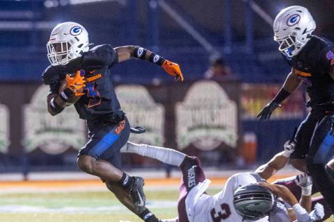 Bishop Gorman running back Devon Rice (3) breaks into open field after missed tackle by Hamilto ...