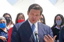 Florida Gov. Ron DeSantis speaks during a news conference, Thursday, April 8, 2021, at PortMiam ...