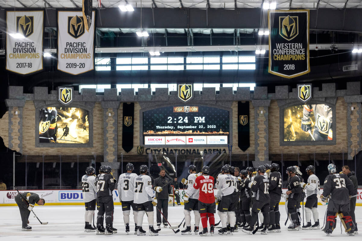 The Golden Knights gather on center ice during the first day of training camp practice at City ...