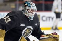 Golden Knights goaltender Adin Hill (33) defends the net during the first day of training camp ...